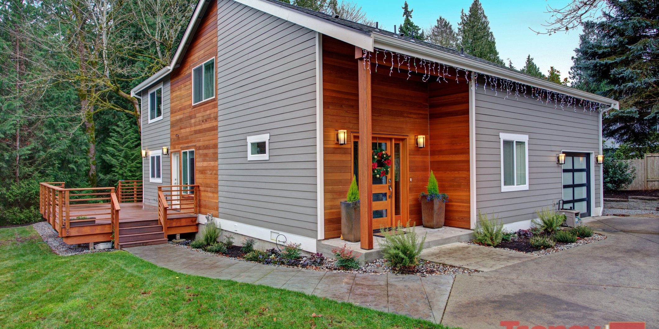 Charming newly renovated home exterior with mixed siding